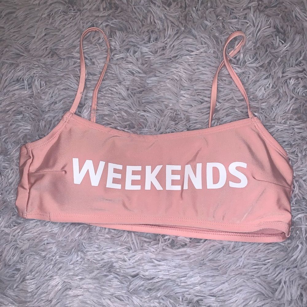 Bra-let in pink spandex. Spaghetti strap. Pale pink. “Weekend” writing SZ SM